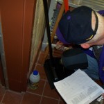 Image of man performing indoor inspection