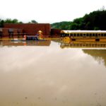 2010 rains, flood waters submerged a Cheatham County school bus, vehicles, and Kingston Springs Elementary School