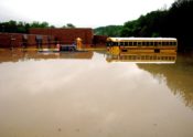 2010 rains, flood waters submerged a Cheatham County school bus, vehicles, and Kingston Springs Elementary School